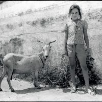 Girl and Her Goat